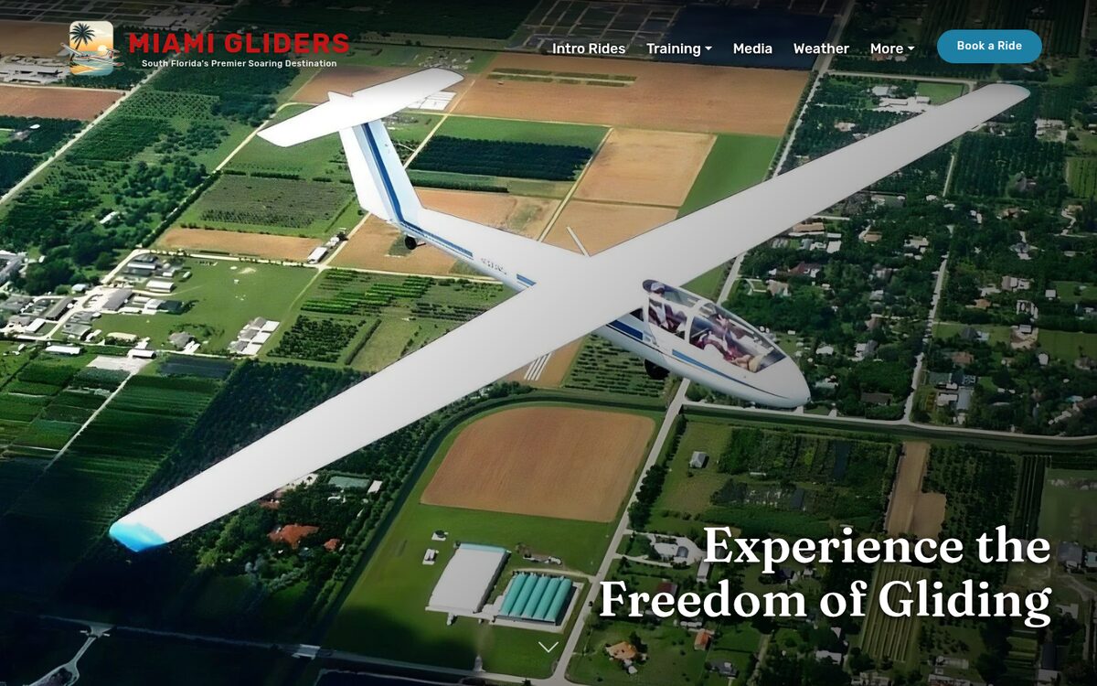Miami Gliders homepage: a glider soaring over South Florida farmland